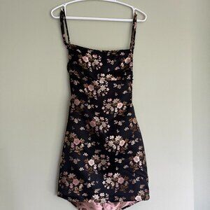 Blackless satin mini dress with flower detail XS Black